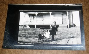 RPPC Real Photo, Girl with Dolls in Carriage/Stroller on Boardwalk