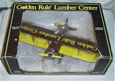 Die Cast Plane, Golden Rule Lumber Center, 1932 Stearman Bi-Plane Bank, MIB